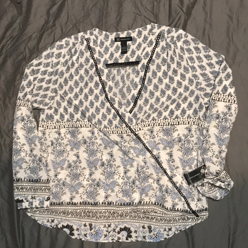INC Blouse in Black, White, and light blue.